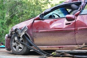 Image of a car damaged in an accident, representing how The Law Office of M. Andrew Brison, PLLC can help you get compensation by trying and appealing a car accident case in West Virginia.