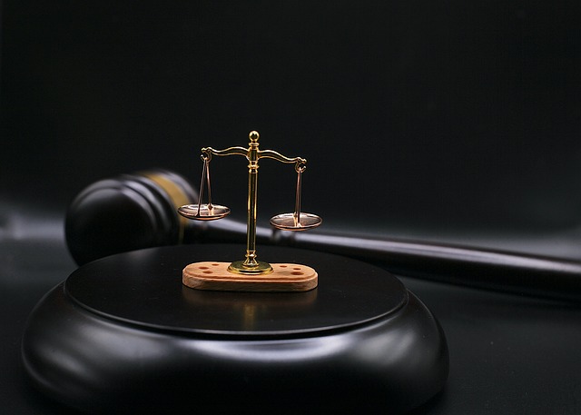 A gavel and scales of justice, representing how liability is apportioned under the West Virginia non-party liability statute.